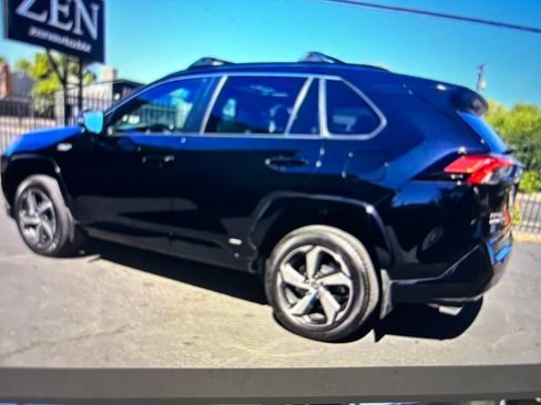 Used 2023 Toyota RAV4 SE w/ Weather & Moonroof Package AWD/4WD image 2
