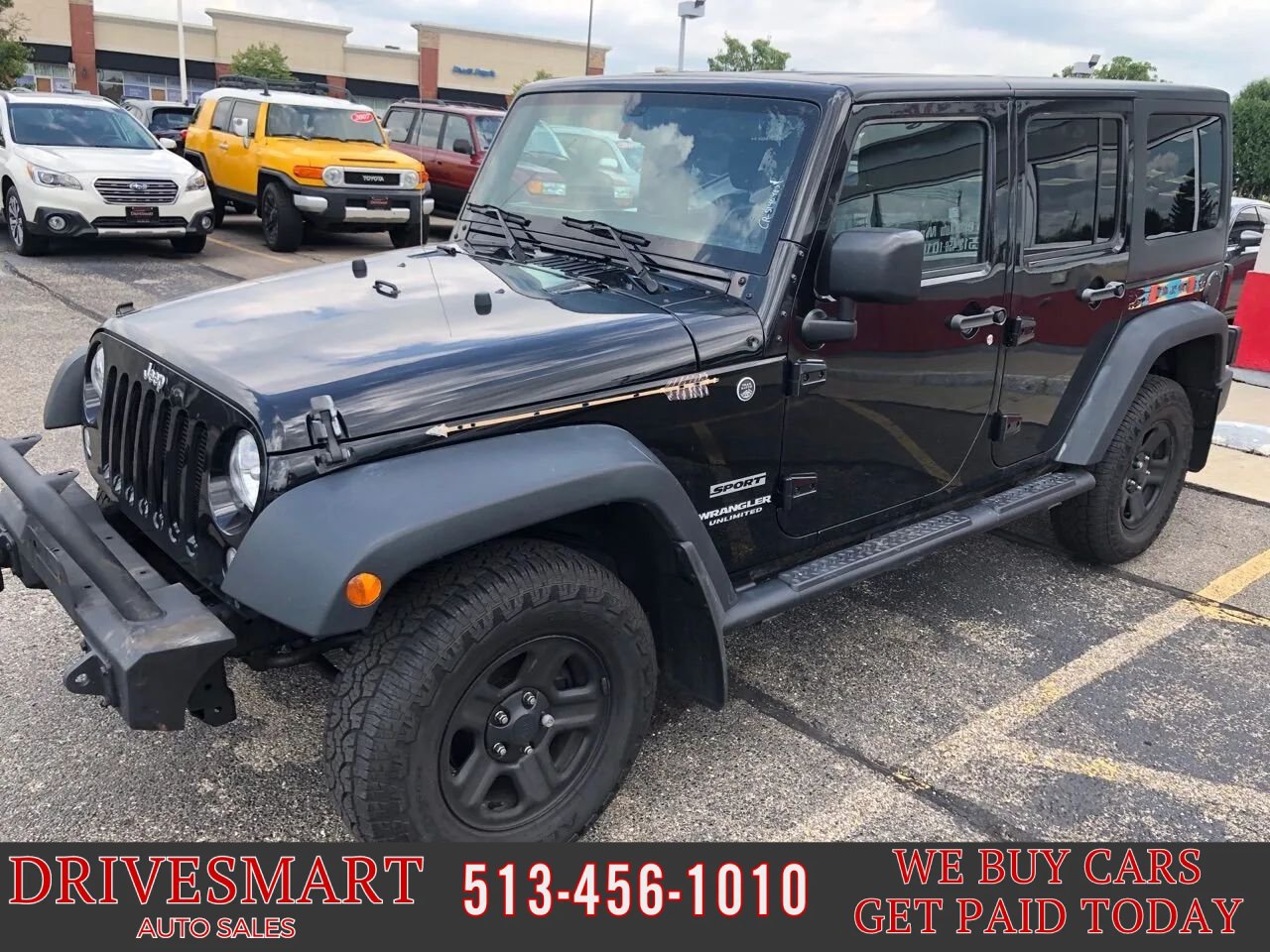 Used 2015 Jeep Wrangler Unlimited Sport w/ Mopar Black Appearance Group AWD/4WD image 1