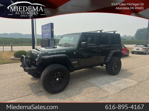 Used 2011 Jeep Wrangler Unlimited Rubicon w/ Connectivity Group AWD/4WD image 1
