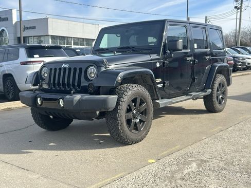 Used 2013 Jeep Wrangler Unlimited Sahara w/ Dual Top Group image 2