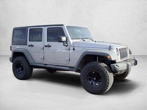 Used 2013 Jeep Wrangler Unlimited Sport w/ Mopar Black Appearance Group AWD/4WD image 15