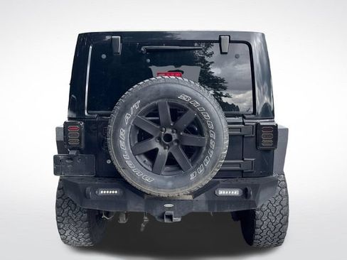 Used 2012 Jeep Wrangler Unlimited Sahara w/ Dual Top Group AWD/4WD image 4