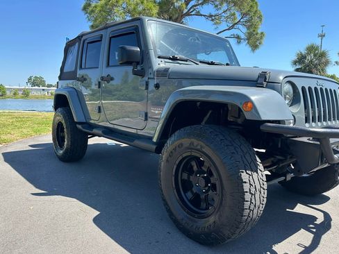 Used 2014 Jeep Wrangler Unlimited Sahara w/ Connectivity Group AWD/4WD image 4