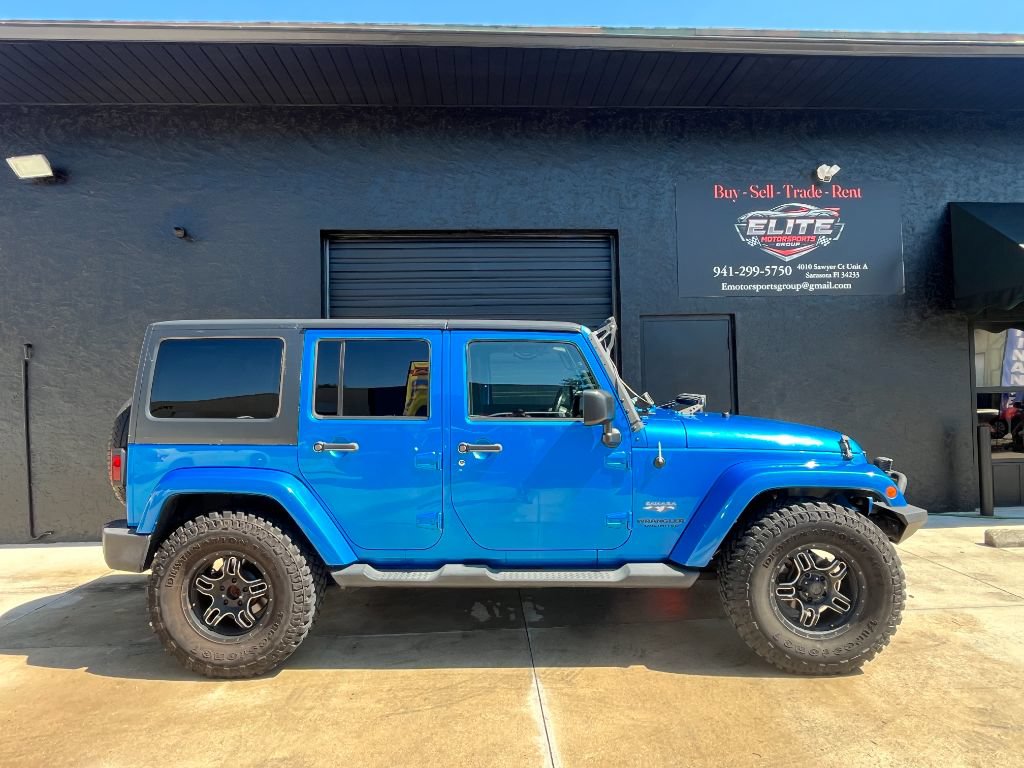 Used 2016 Jeep Wrangler Unlimited Sahara w/ Max Tow Package AWD/4WD image 1