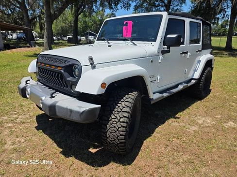 Used 2016 Jeep Wrangler Unlimited Sahara w/ Connectivity Group AWD/4WD image 1