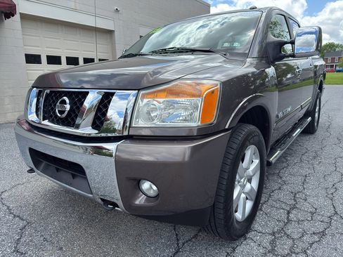 Used 2015 Nissan Titan SL w/ SL Moonroof Package AWD/4WD image 1