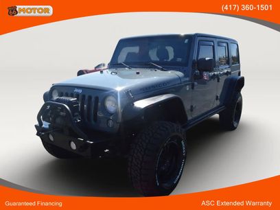 Used 2014 Jeep Wrangler Unlimited Rubicon w/ Dual Top Group