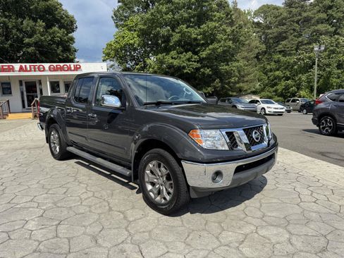 Used 2015 Nissan Frontier SL AWD/4WD image 1