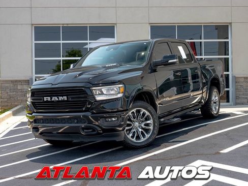 Used 2019 RAM 1500 Laramie AWD/4WD image 1