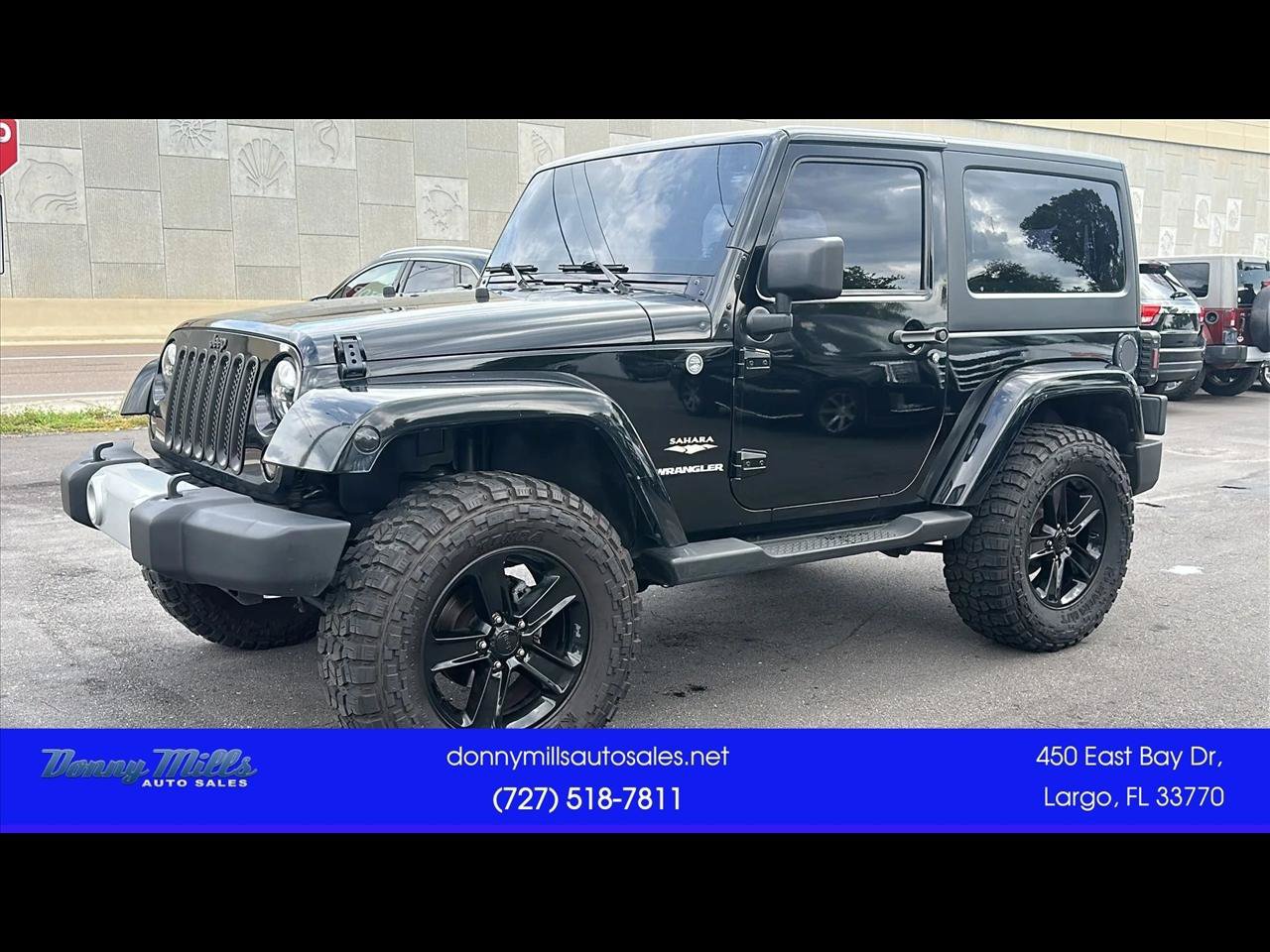 Used 2013 Jeep Wrangler Sahara AWD/4WD image 1