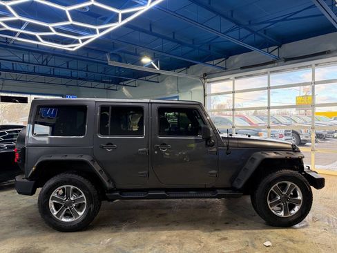 Used 2014 Jeep Wrangler Unlimited Sahara w/ Dual Top Group image 9