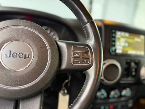 Used 2015 Jeep Wrangler Unlimited Sahara w/ Dual Top Group AWD/4WD image 22
