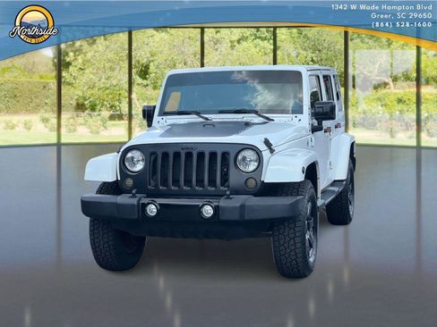 Used 2014 Jeep Wrangler Unlimited Sahara AWD/4WD image 1