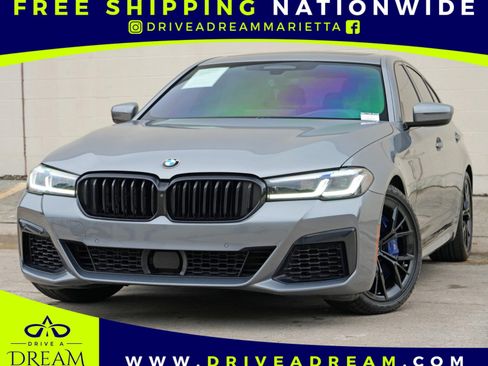 Used 2023 BMW M550i xDrive w/ Executive Package AWD/4WD image 1