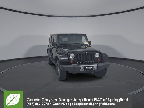 Used 2011 Jeep Wrangler Unlimited Sport w/ Connectivity Group AWD/4WD image 4