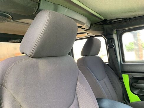 Used 2013 Jeep Wrangler Unlimited Sport w/ Mopar Black Appearance Group image 12