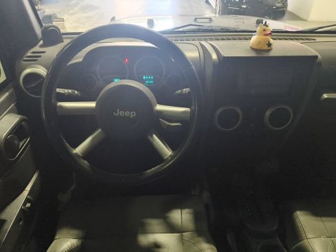 Used 2010 Jeep Wrangler Unlimited Sahara w/ Dual Top Group AWD/4WD image 13