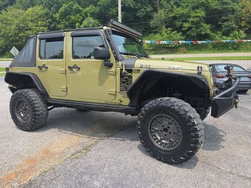 Used 2013 Jeep Wrangler Unlimited Sport w/ Trailer Tow Group AWD/4WD image 4