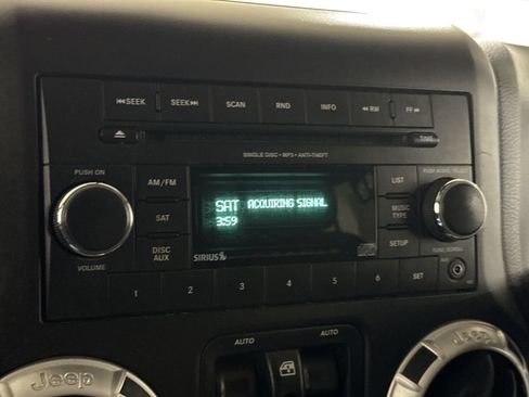 Used 2013 Jeep Wrangler Unlimited Sahara w/ Dual Top Group AWD/4WD image 14