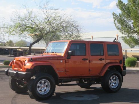 Used 2010 Jeep Wrangler Unlimited Sport w/ Black Appearance Group image 1
