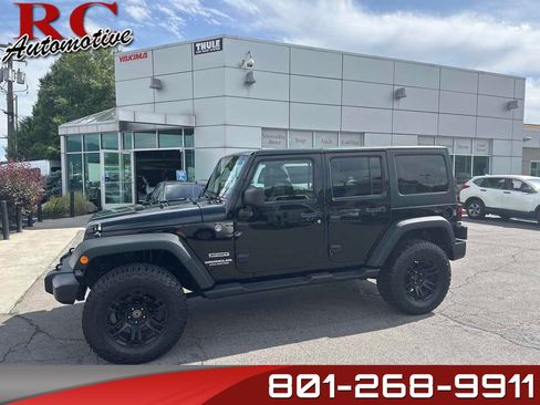 Used 2013 Jeep Wrangler Unlimited Sport image 1