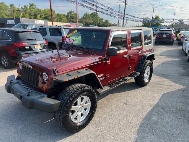 Used 2007 Jeep Wrangler Unlimited Sahara w/ Dual Top Group RWD image 1