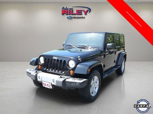 Used 2012 Jeep Wrangler Unlimited Sahara w/ Dual Top Group image 1