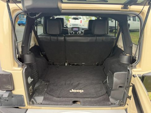 Used 2012 Jeep Wrangler Unlimited Sahara w/ Dual Top Group AWD/4WD image 12