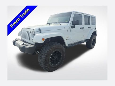 Used 2014 Jeep Wrangler Unlimited Sahara w/ Dual Top Group AWD/4WD image 1