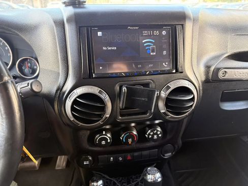 Used 2015 Jeep Wrangler Unlimited Sport w/ Connectivity Group AWD/4WD image 14