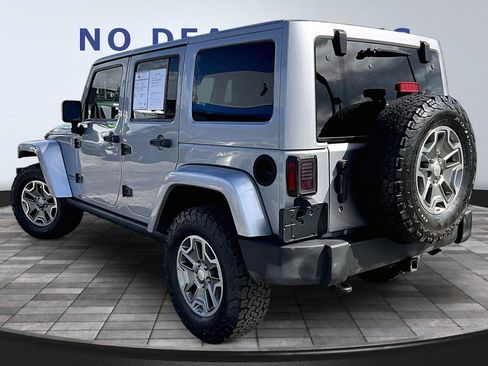 Used 2014 Jeep Wrangler Unlimited Rubicon w/ Dual Top Group AWD/4WD image 4