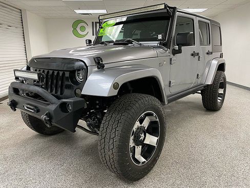 Used 2013 Jeep Wrangler Unlimited Sahara w/ Connectivity Group AWD/4WD image 1