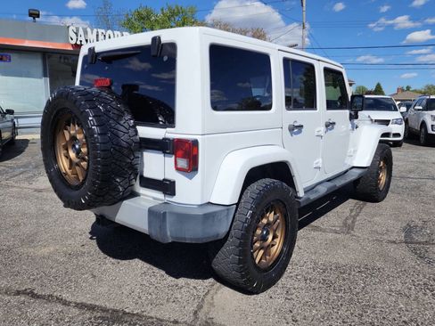 Used 2012 Jeep Wrangler Unlimited Sahara w/ Trailer Tow Group AWD/4WD image 5