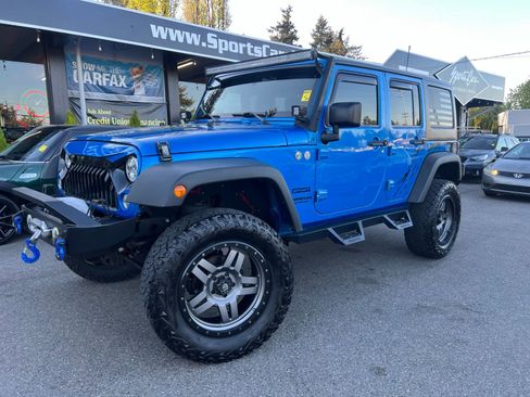 Used 2016 Jeep Wrangler Unlimited Sport w/ Connectivity Group AWD/4WD image 1