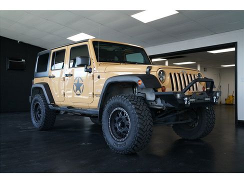 Used 2013 Jeep Wrangler Unlimited Sahara w/ Dual Top Group AWD/4WD image 1