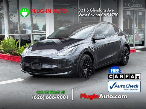 Used 2024 Tesla Model Y Long Range AWD/4WD image 1