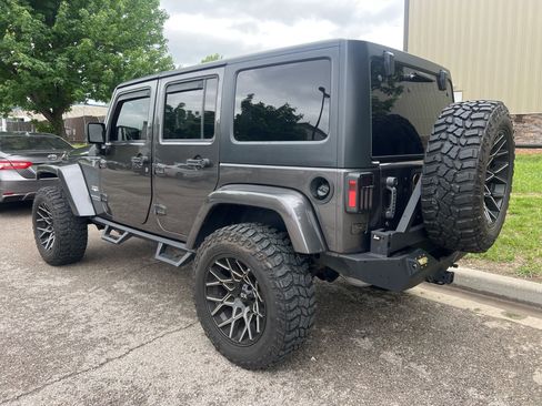 Used 2014 Jeep Wrangler Unlimited Sahara w/ Dual Top Group AWD/4WD image 7