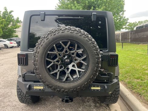 Used 2014 Jeep Wrangler Unlimited Sahara w/ Dual Top Group AWD/4WD image 6