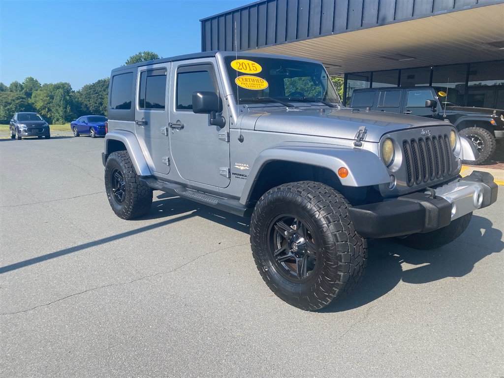Used 2015 Jeep Wrangler Unlimited Sahara w/ Connectivity Group AWD/4WD image 1