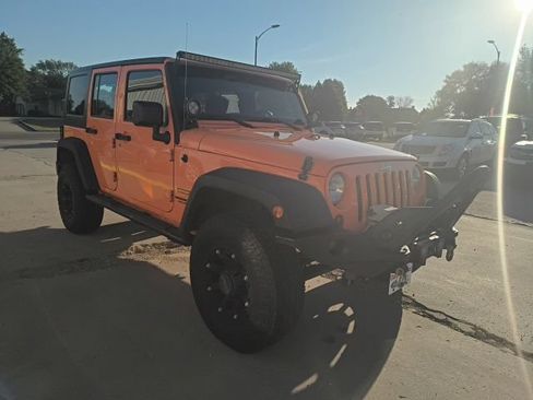 Used 2012 Jeep Wrangler Unlimited Sport w/ Black Appearance Group AWD/4WD image 4