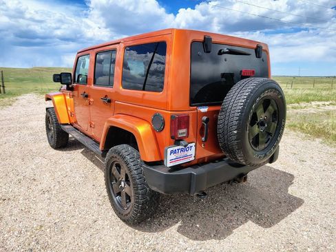 Used 2011 Jeep Wrangler Unlimited Sahara w/ Dual Top Group AWD/4WD image 3
