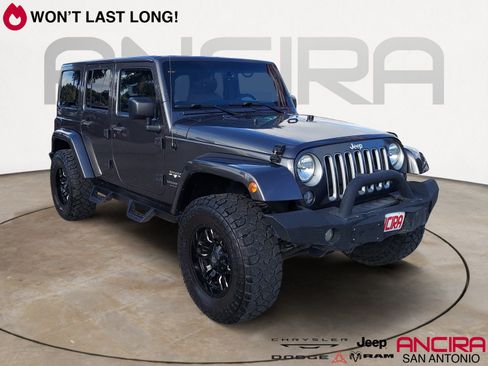 Used 2016 Jeep Wrangler Unlimited Sahara w/ Max Tow Package AWD/4WD image 1