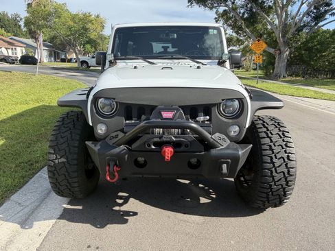 Used 2014 Jeep Wrangler Unlimited Rubicon w/ Dual Top Group AWD/4WD image 7