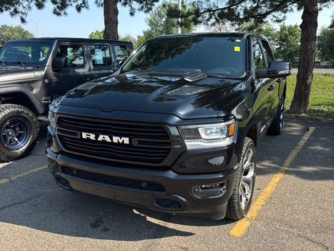 Used 2024 RAM 1500 Laramie AWD/4WD image 1