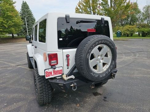 Used 2012 Jeep Wrangler Unlimited Sahara w/ Dual Top Group AWD/4WD image 3