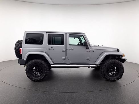 Used 2014 Jeep Wrangler Unlimited Sahara w/ Mopar Chrome Edition Group AWD/4WD image 6