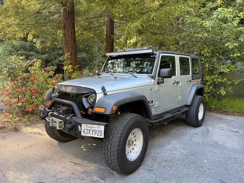 Used 2009 Jeep Wrangler Unlimited X AWD/4WD image 1