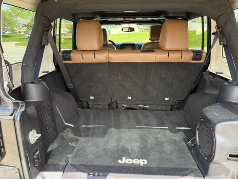 Used 2013 Jeep Wrangler Unlimited Sahara w/ Dual Top Group AWD/4WD image 19