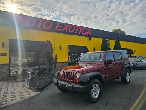 Used 2013 Jeep Wrangler Unlimited Sport AWD/4WD image 1