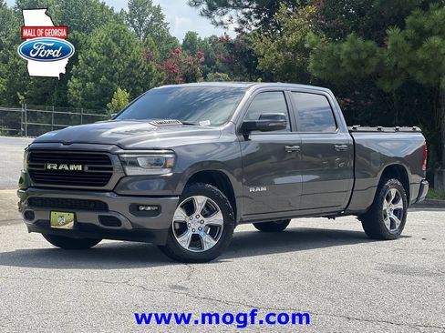Used 2023 RAM 1500 Laramie AWD/4WD image 1
